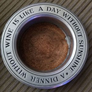 Wine bottle coaster